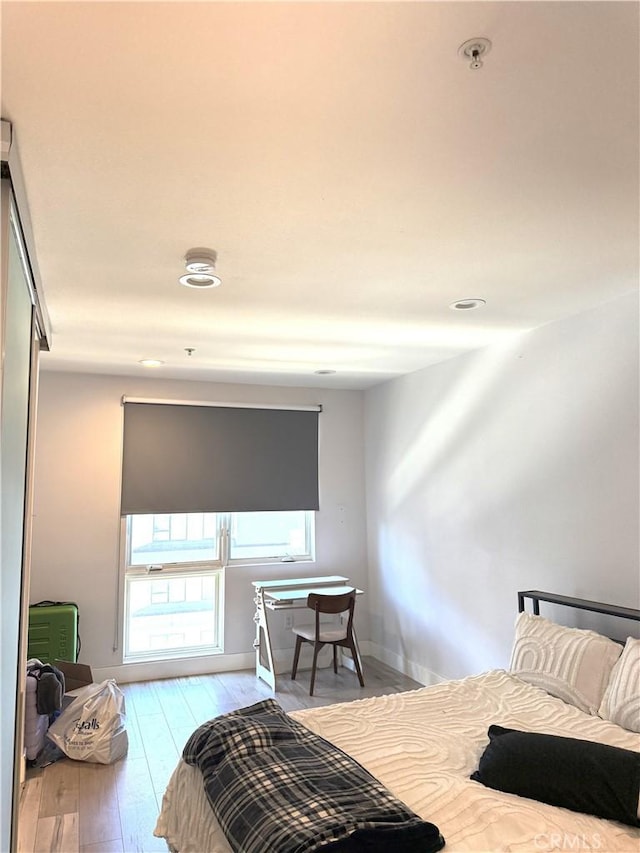 1234 Wilshire Blvd Unit 330, Los Angeles, CA 90017 - bedroom with hardwood / wood-style floors and baseboards