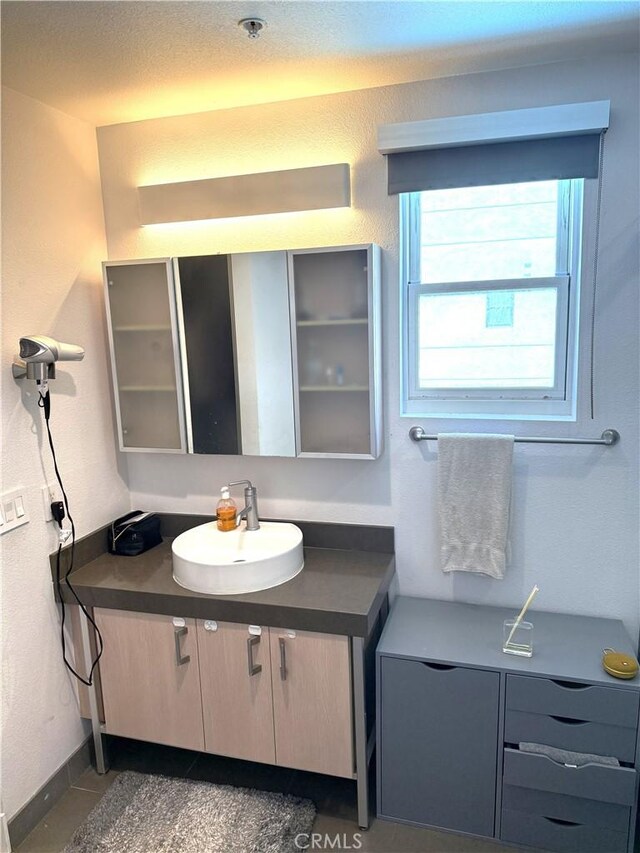 1234 Wilshire Blvd Unit 330, Los Angeles, CA 90017 - bathroom with vanity and tile patterned floors