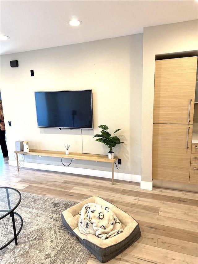 1234 Wilshire Blvd Unit 330, Los Angeles, CA 90017 - living area with hardwood / wood-style flooring and recessed lighting