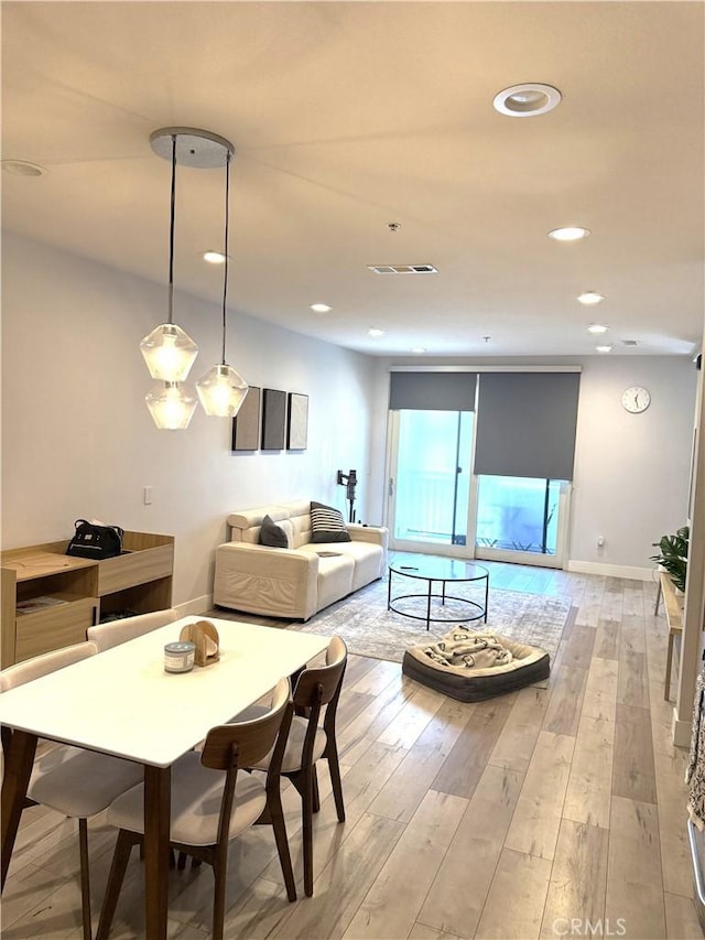 1234 Wilshire Blvd Unit 330, Los Angeles, CA 90017 - dining room featuring light wood-style flooring and recessed lighting
