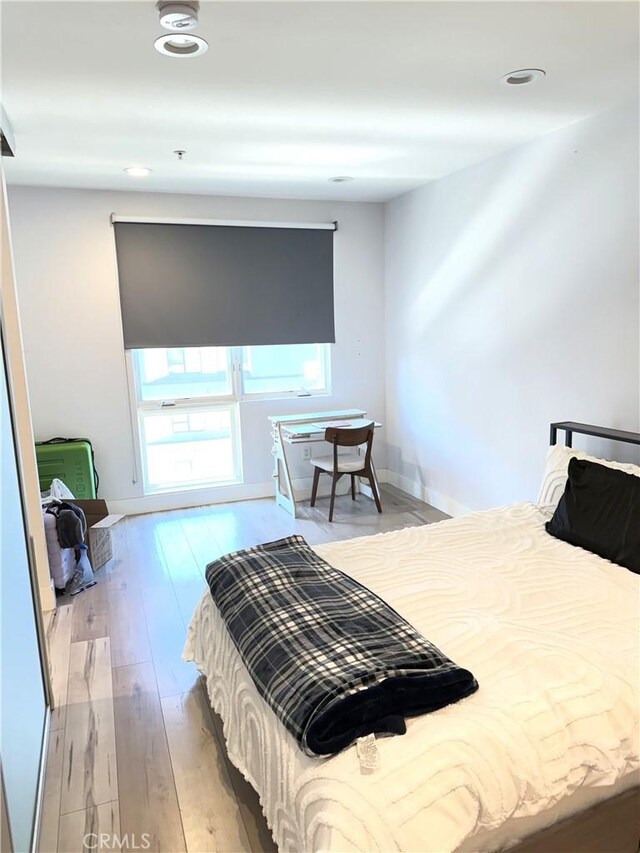 1234 Wilshire Blvd Unit 330, Los Angeles, CA 90017 - bedroom featuring light wood finished floors and recessed lighting