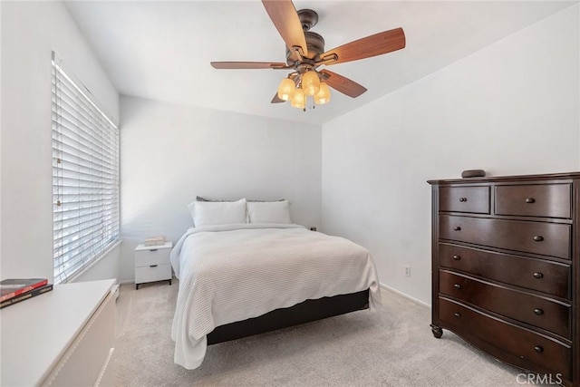 7147 Fulton Way, Stanton, CA 90680 - bedroom featuring light colored carpet, multiple windows, and a ceiling fan