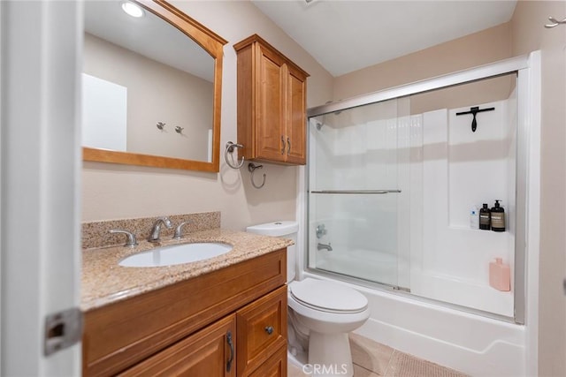 7147 Fulton Way, Stanton, CA 90680 - full bath featuring vanity, enclosed tub / shower combo, and tile patterned flooring