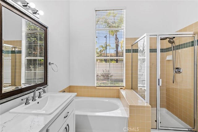 27884 Via De Costa, San Juan Capistrano, CA 92675 - bathroom with vanity, a bath, and a stall shower