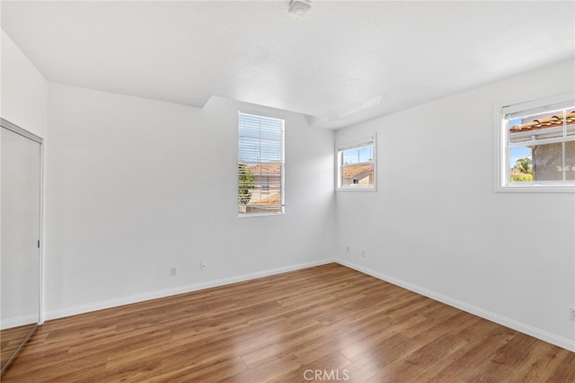 27884 Via De Costa, San Juan Capistrano, CA 92675 - empty room featuring wood finished floors and a smoke detector