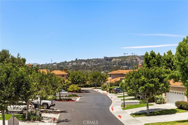 27884 Via De Costa, San Juan Capistrano, CA 92675 - view of asphalt road with curbs and sidewalks
