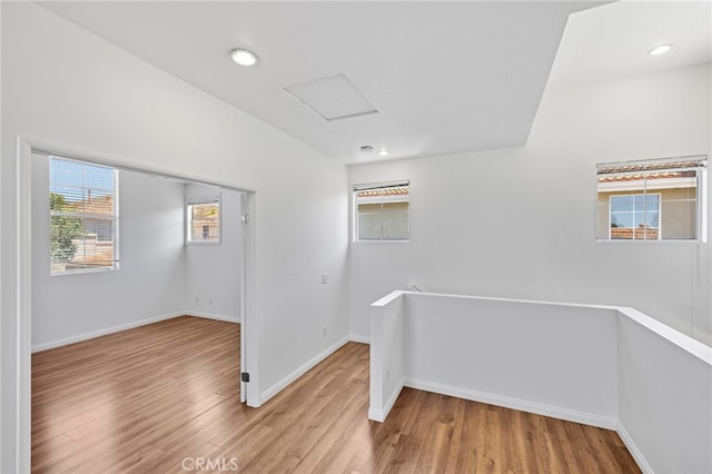 27884 Via De Costa, San Juan Capistrano, CA 92675 - hall featuring an upstairs landing, attic access, wood finished floors, and recessed lighting