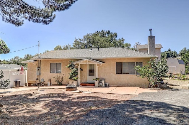 1242 Marshall Rd, Alpine, CA 91901 - back of property featuring stucco siding, a patio area, and a chimney