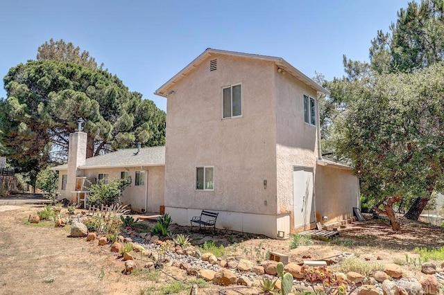 1242 Marshall Rd, Alpine, CA 91901 - view of side of property featuring a chimney and stucco siding