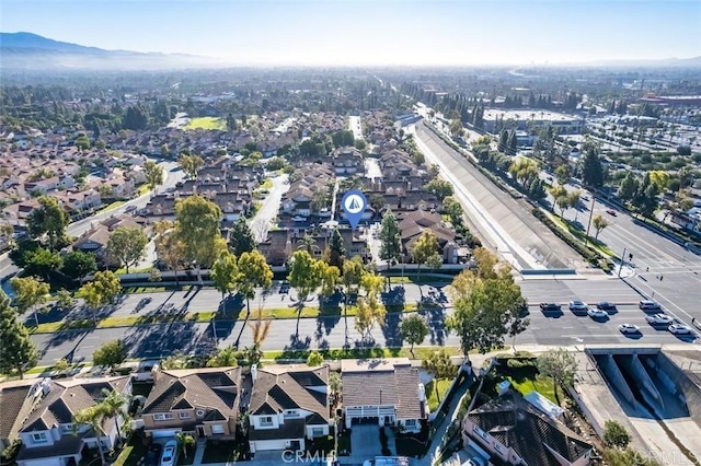 13425 Via Almeria, Tustin, CA 92782 - aerial view of property and surrounding area featuring nearby suburban area and a mountainous background