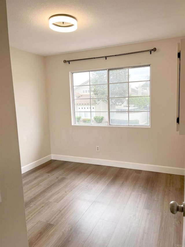 13425 Via Almeria, Tustin, CA 92782 - spare room featuring wood finished floors