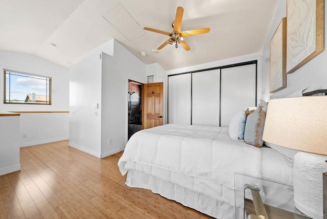 7439 Carrie Ridge Way, San Diego, CA 92139 - bedroom featuring vaulted ceiling, light wood-style floors, a closet, and a ceiling fan