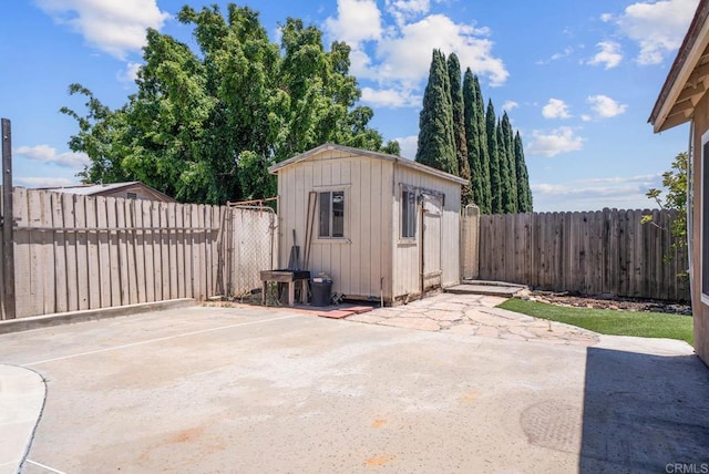 7439 Carrie Ridge Way, San Diego, CA 92139 - fenced backyard with a patio area and a shed