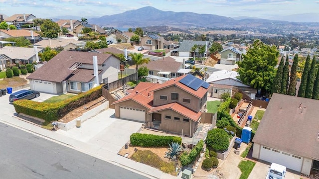7439 Carrie Ridge Way, San Diego, CA 92139 - aerial perspective of suburban area with a mountain backdrop