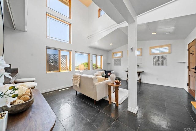 7439 Carrie Ridge Way, San Diego, CA 92139 - living area with baseboards and high vaulted ceiling
