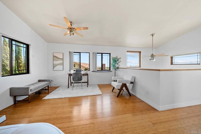 7439 Carrie Ridge Way, San Diego, CA 92139 - living area featuring lofted ceiling, a ceiling fan, and light wood finished floors