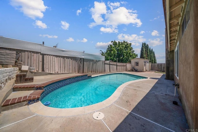 7439 Carrie Ridge Way, San Diego, CA 92139 - view of pool with a patio, a storage unit, and a fenced backyard