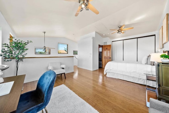 7439 Carrie Ridge Way, San Diego, CA 92139 - bedroom with light wood-type flooring, lofted ceiling, and ceiling fan