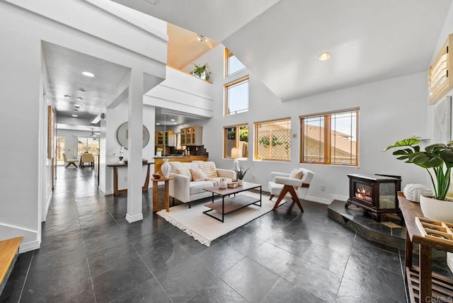 7439 Carrie Ridge Way, San Diego, CA 92139 - living room featuring a wood stove and recessed lighting