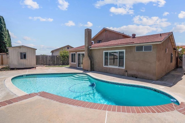 7439 Carrie Ridge Way, San Diego, CA 92139 - view of pool with a patio, a fenced backyard, and a storage unit