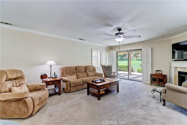 1255 S Upland Hills Dr S, Upland, CA 91786 - living area featuring crown molding, light carpet, ceiling fan, and a fireplace