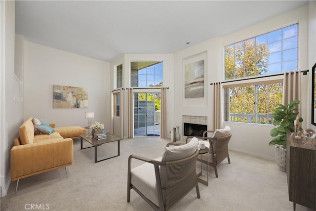 33072 Ocean Rdg, Dana Point, CA 92629 - living area with light carpet, healthy amount of natural light, and a fireplace