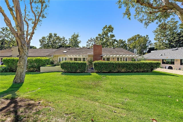 2719 Vista Umbrosa, Newport Beach, CA 92660 - back of property with a chimney and a lawn