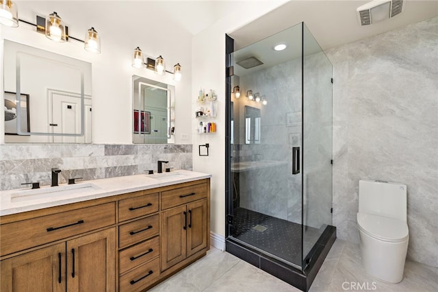 2719 Vista Umbrosa, Newport Beach, CA 92660 - full bathroom featuring double vanity, a shower stall, tile patterned floors, tile walls, and backsplash