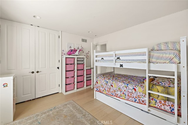 2719 Vista Umbrosa, Newport Beach, CA 92660 - bedroom featuring wood finished floors, a closet, and recessed lighting