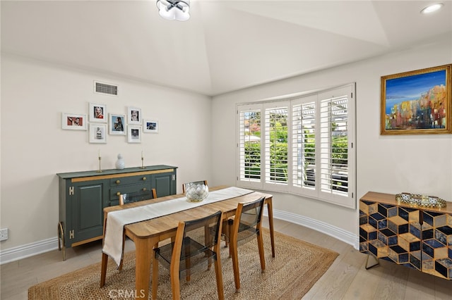 2719 Vista Umbrosa, Newport Beach, CA 92660 - dining room with light wood-style flooring and lofted ceiling