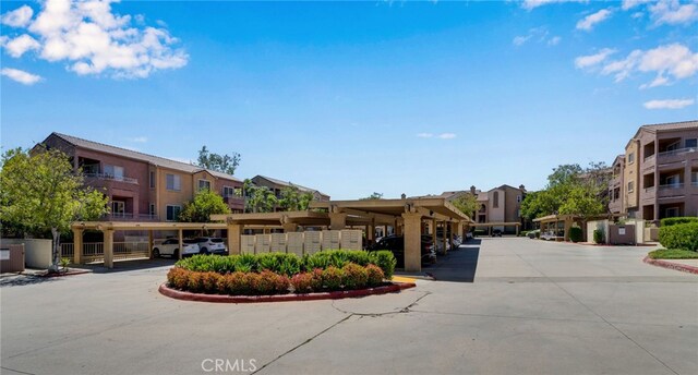 2500 San Gabriel Way Unit 306, Corona, CA 92882 - view of street featuring a residential view