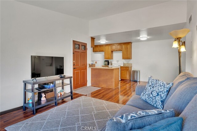 2500 San Gabriel Way Unit 306, Corona, CA 92882 - living area with wood finished floors and baseboards