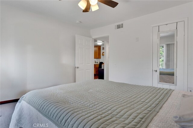 2500 San Gabriel Way Unit 306, Corona, CA 92882 - bedroom with ceiling fan and carpet flooring