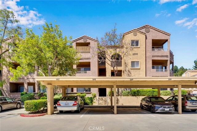 2500 San Gabriel Way Unit 306, Corona, CA 92882 - view of building exterior with covered parking