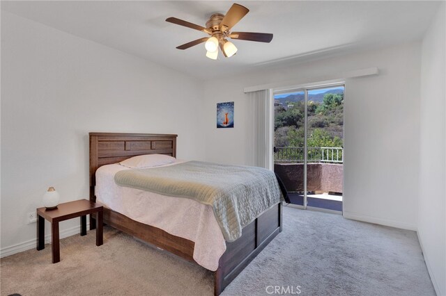 2500 San Gabriel Way Unit 306, Corona, CA 92882 - bedroom with carpet floors, access to outside, and ceiling fan