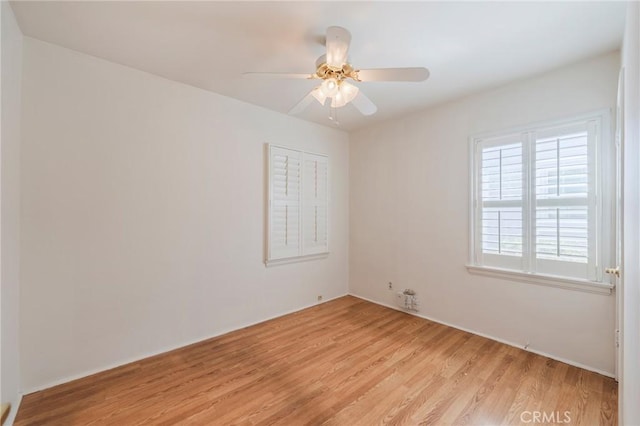2605 Robinson St, Redondo Beach, CA 90278 - empty room with light wood finished floors and a ceiling fan
