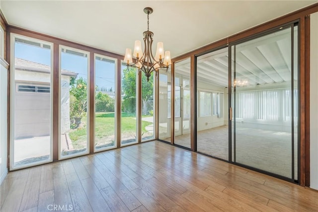 2605 Robinson St, Redondo Beach, CA 90278 - unfurnished sunroom featuring a chandelier and wood finished floors