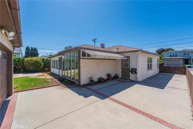 2605 Robinson St, Redondo Beach, CA 90278 - rear view of house with stucco siding and a patio