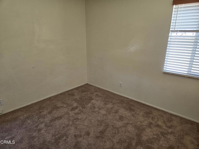 45409 Rodin Ave, Lancaster, CA 93535 - spare room featuring carpet and baseboards