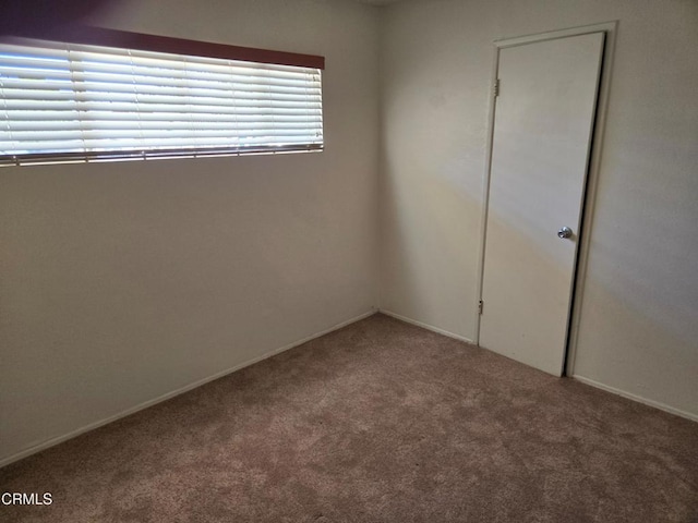 45409 Rodin Ave, Lancaster, CA 93535 - carpeted spare room featuring baseboards