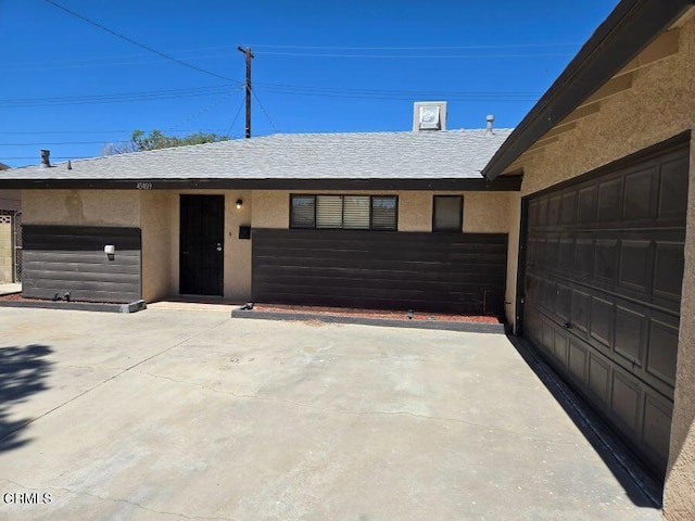 45409 Rodin Ave, Lancaster, CA 93535 - view of front of property with stucco siding and driveway