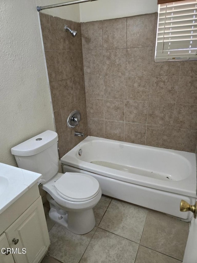 45409 Rodin Ave, Lancaster, CA 93535 - bathroom featuring vanity, shower / bath combination, tile patterned flooring, and a textured wall