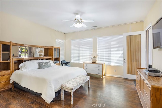 60284 Honeysuckle St, La Quinta, CA 92253 - bedroom with dark wood finished floors and ceiling fan