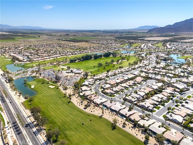60284 Honeysuckle St, La Quinta, CA 92253 - aerial view of property and surrounding area with a water and mountain view and nearby suburban area