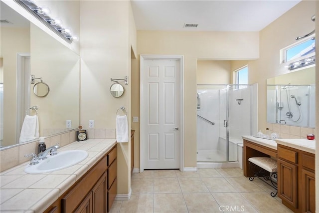60284 Honeysuckle St, La Quinta, CA 92253 - bathroom with a shower stall, vanity, and tile patterned floors
