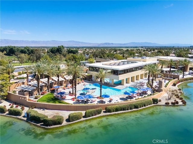 60284 Honeysuckle St, La Quinta, CA 92253 - drone / aerial view of a pool area and a mountainous background