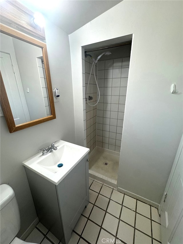 7892 8th St, Buena Park, CA 90621 - bathroom featuring a shower stall, vanity, and tile patterned floors
