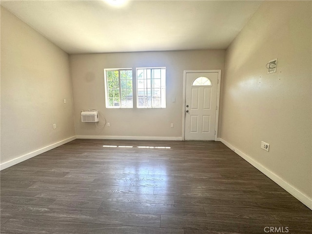 7892 8th St, Buena Park, CA 90621 - foyer entrance with dark wood finished floors and a wall mounted AC