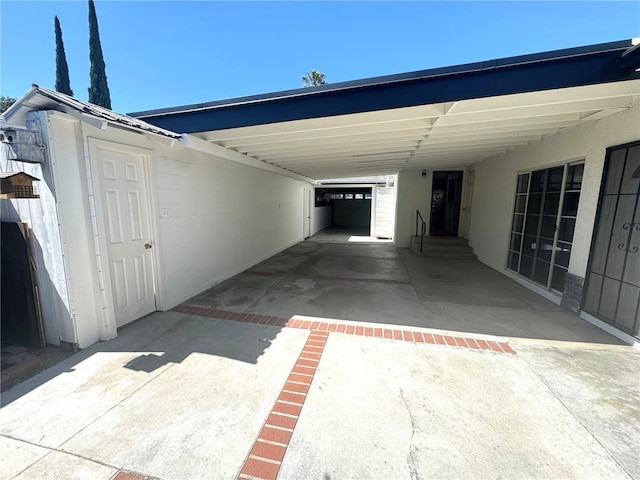 7892 8th St, Buena Park, CA 90621 - view of car parking with a carport and concrete driveway