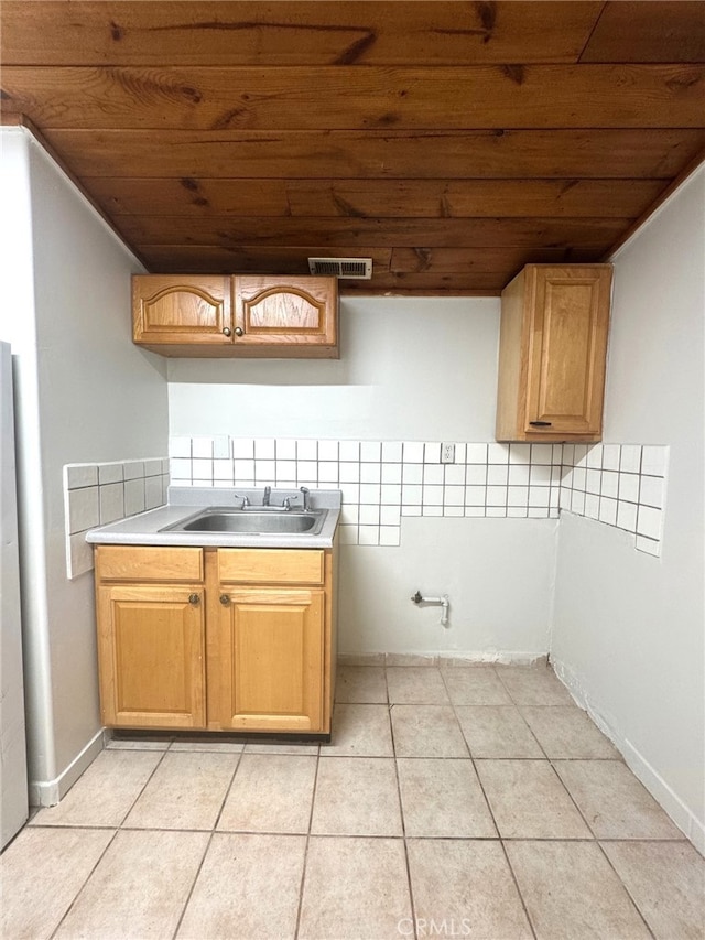 7892 8th St, Buena Park, CA 90621 - kitchen with wooden ceiling, light tile patterned floors, light countertops, and tasteful backsplash